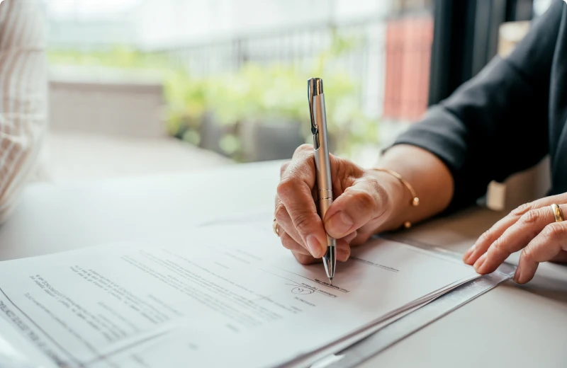 Person filling out a form